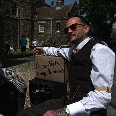 Cinque Ports Lindy Hoppers: Dover Castle World War 2 weekend - May 2018 - Dapper Dru, looking not so dapper between sets taking a break at the NAAFI wagon - Photo by Sarah Haines