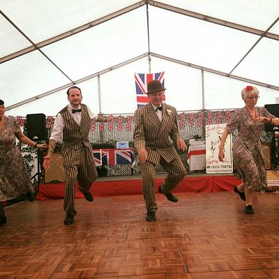 Cinque Ports Lindy Hoppers: Tenterden KESR 1940s Steam weekend May 2016 - Sugarfoot Sophie, Dapper Dru, Gypsy John and Jan tapping the Gooofus Tap Shim Sham - Photo courtesy of My Favourite Things